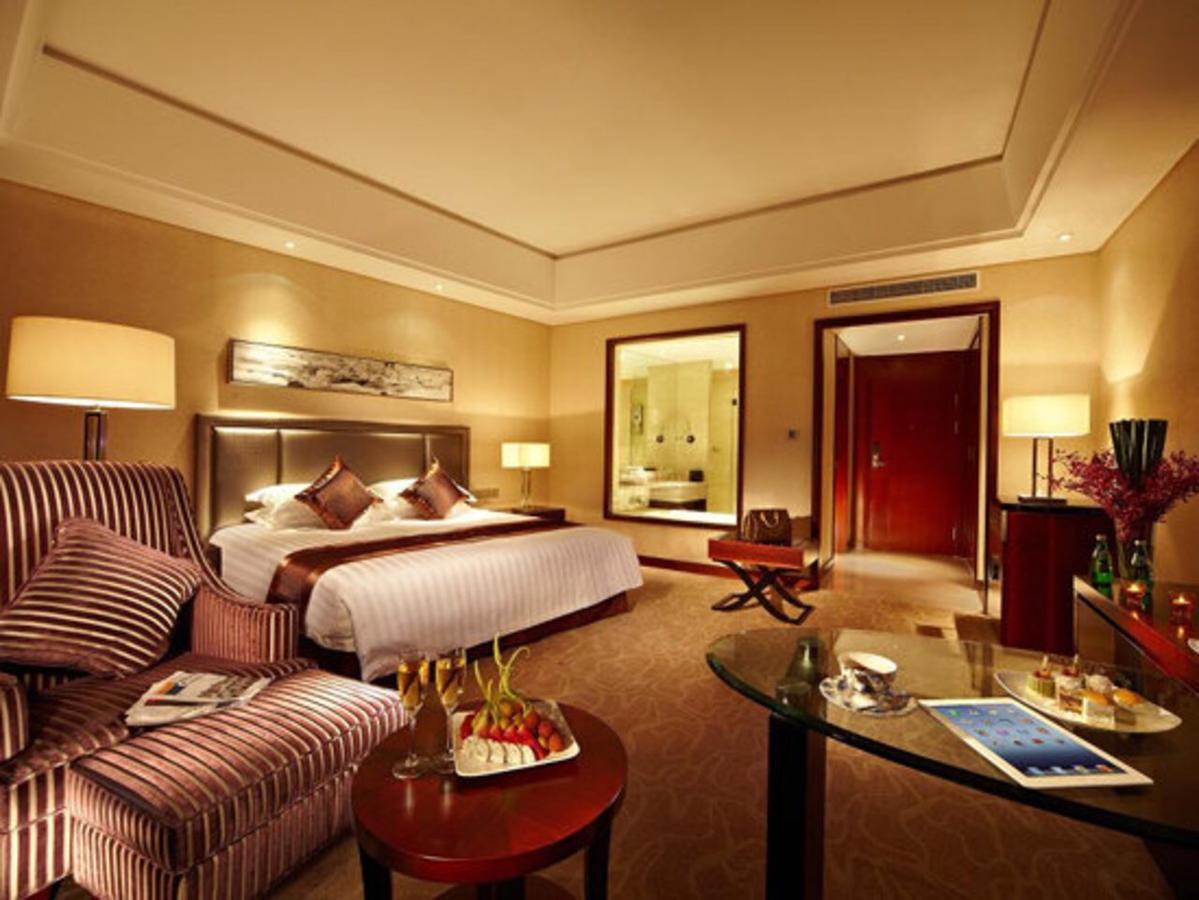 Jurong Yukun New Century Hotel Jiangsu Quarto foto